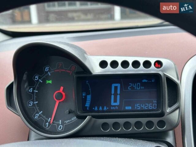 Червоний Шевроле Авео, об'ємом двигуна 1.4 л та пробігом 154 тис. км за 6200 $, фото 8 на Automoto.ua