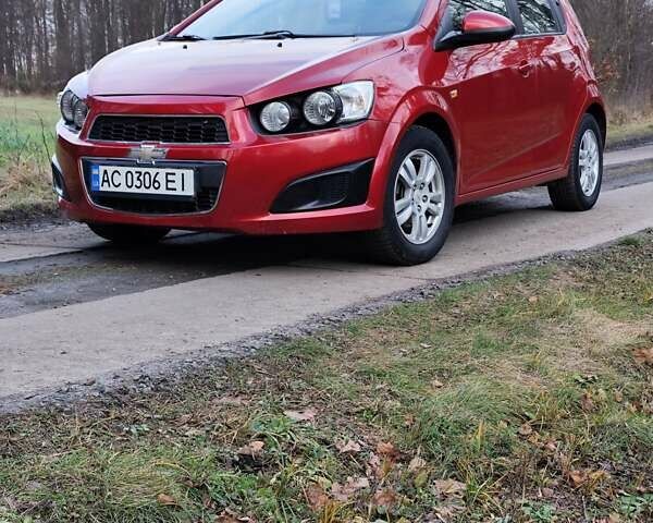 Червоний Шевроле Авео, об'ємом двигуна 1.3 л та пробігом 250 тис. км за 5999 $, фото 5 на Automoto.ua