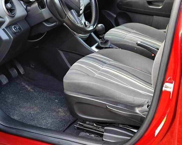 Червоний Шевроле Авео, об'ємом двигуна 1.3 л та пробігом 250 тис. км за 5999 $, фото 10 на Automoto.ua