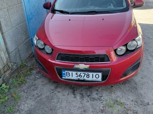Красный Шевроле Авео, объемом двигателя 1.2 л и пробегом 165 тыс. км за 4000 $, фото 1 на Automoto.ua