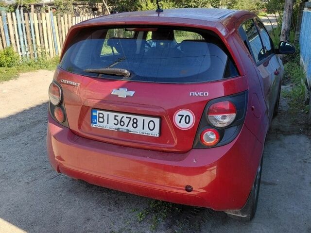 Красный Шевроле Авео, объемом двигателя 1.2 л и пробегом 165 тыс. км за 4000 $, фото 2 на Automoto.ua