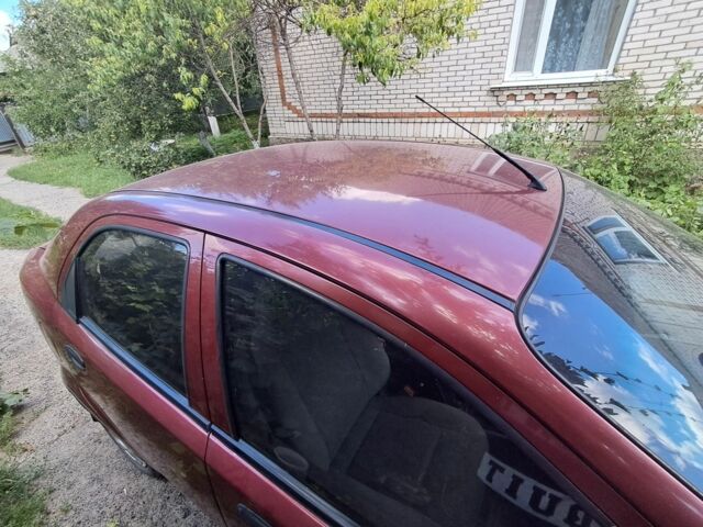 Красный Шевроле Авео, объемом двигателя 1.5 л и пробегом 300 тыс. км за 1800 $, фото 2 на Automoto.ua