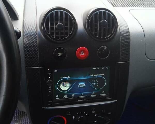 Красный Шевроле Авео, объемом двигателя 1.5 л и пробегом 168 тыс. км за 2600 $, фото 10 на Automoto.ua