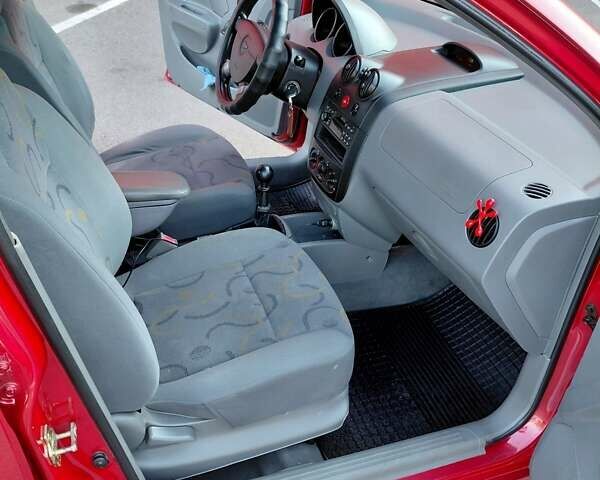 Красный Шевроле Авео, объемом двигателя 1.5 л и пробегом 150 тыс. км за 3750 $, фото 8 на Automoto.ua