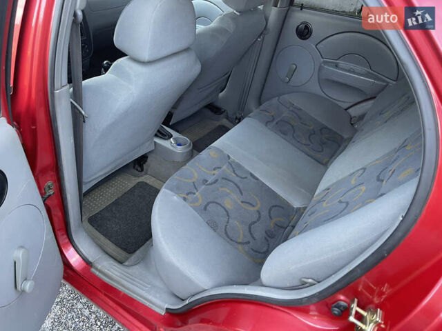 Червоний Шевроле Авео, об'ємом двигуна 1.5 л та пробігом 150 тис. км за 2999 $, фото 10 на Automoto.ua