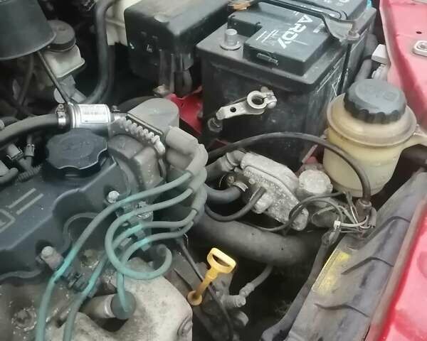 Красный Шевроле Авео, объемом двигателя 1.5 л и пробегом 250 тыс. км за 2650 $, фото 29 на Automoto.ua