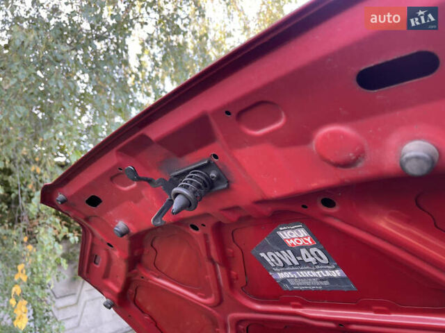 Червоний Шевроле Авео, об'ємом двигуна 1.5 л та пробігом 150 тис. км за 2999 $, фото 13 на Automoto.ua