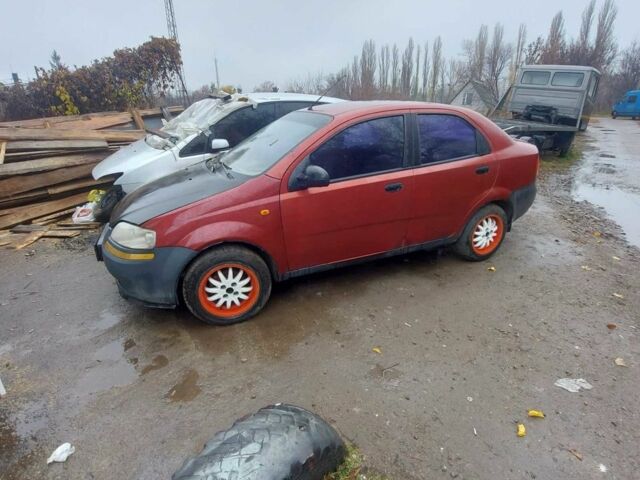 Красный Шевроле Авео, объемом двигателя 1.5 л и пробегом 200 тыс. км за 1450 $, фото 1 на Automoto.ua