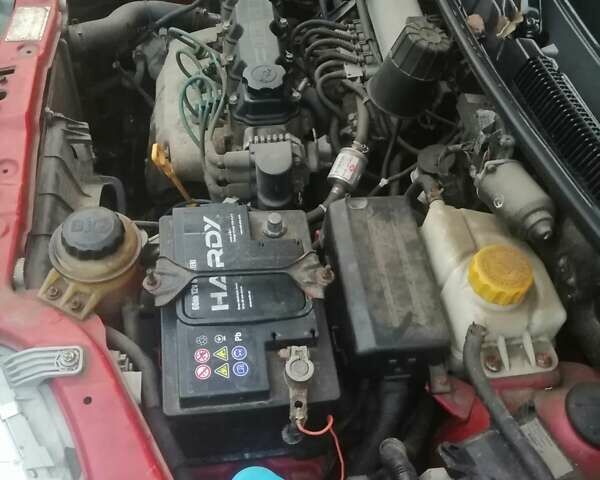 Красный Шевроле Авео, объемом двигателя 1.5 л и пробегом 250 тыс. км за 2650 $, фото 24 на Automoto.ua