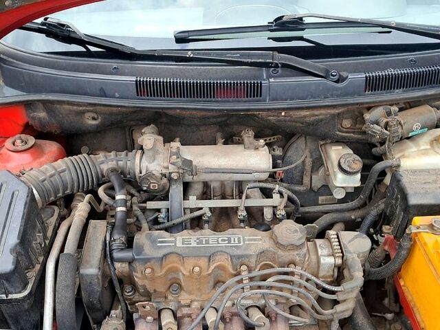 Красный Шевроле Авео, объемом двигателя 1.5 л и пробегом 203 тыс. км за 2850 $, фото 12 на Automoto.ua