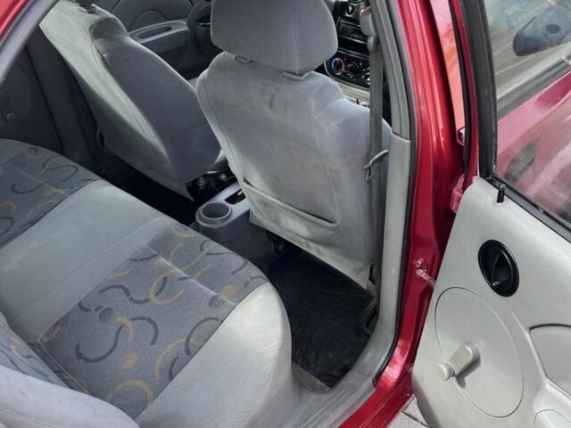 Красный Шевроле Авео, объемом двигателя 1.5 л и пробегом 200 тыс. км за 1950 $, фото 13 на Automoto.ua