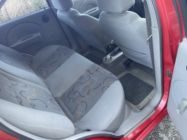 Красный Шевроле Авео, объемом двигателя 1.5 л и пробегом 150 тыс. км за 3300 $, фото 9 на Automoto.ua