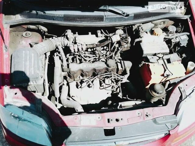 Червоний Шевроле Авео, об'ємом двигуна 1.5 л та пробігом 215 тис. км за 3500 $, фото 5 на Automoto.ua