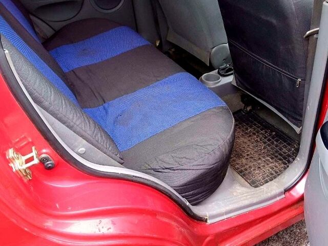 Красный Шевроле Авео, объемом двигателя 1.5 л и пробегом 250 тыс. км за 2200 $, фото 4 на Automoto.ua