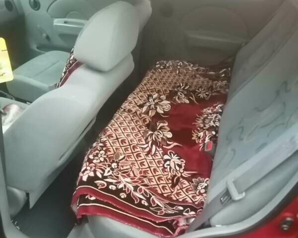 Красный Шевроле Авео, объемом двигателя 1.5 л и пробегом 250 тыс. км за 2650 $, фото 21 на Automoto.ua