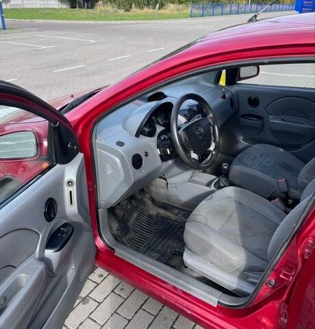 Красный Шевроле Авео, объемом двигателя 1.5 л и пробегом 200 тыс. км за 1950 $, фото 9 на Automoto.ua