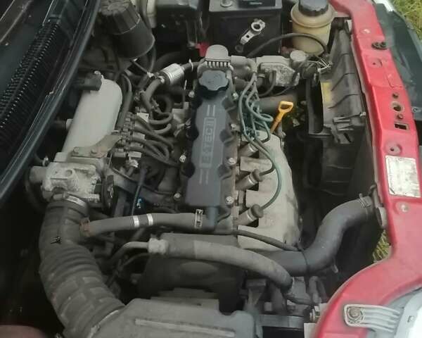 Красный Шевроле Авео, объемом двигателя 1.5 л и пробегом 250 тыс. км за 2650 $, фото 26 на Automoto.ua