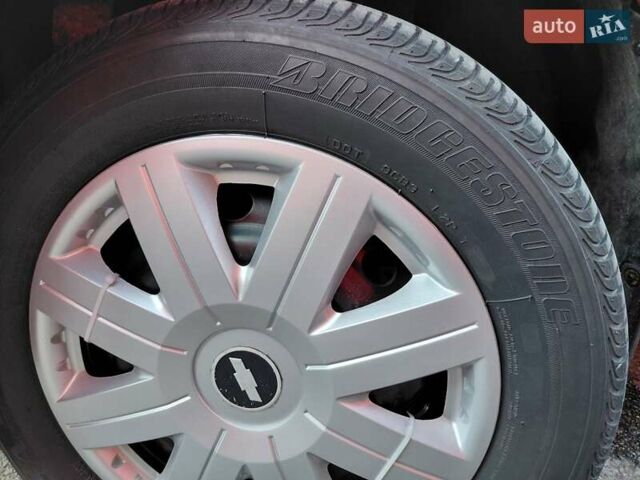 Красный Шевроле Авео, объемом двигателя 1.5 л и пробегом 150 тыс. км за 3750 $, фото 11 на Automoto.ua