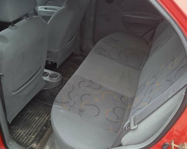 Красный Шевроле Авео, объемом двигателя 1.5 л и пробегом 168 тыс. км за 2600 $, фото 13 на Automoto.ua