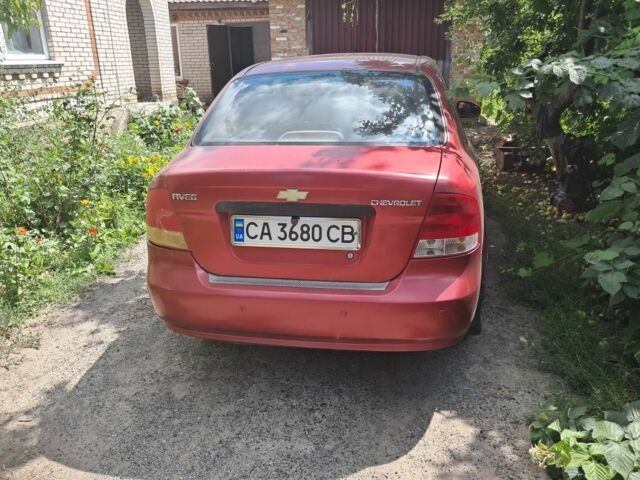 Красный Шевроле Авео, объемом двигателя 1.5 л и пробегом 300 тыс. км за 1800 $, фото 5 на Automoto.ua
