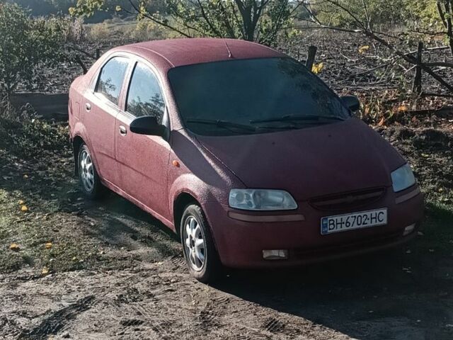 Красный Шевроле Авео, объемом двигателя 1.5 л и пробегом 550 тыс. км за 2700 $, фото 1 на Automoto.ua