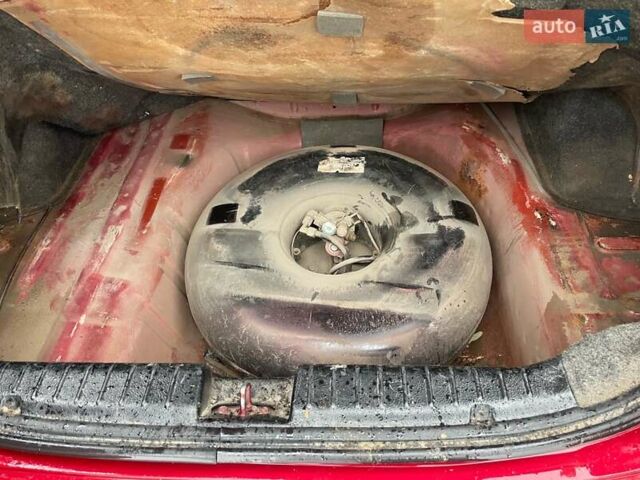 Червоний Шевроле Авео, об'ємом двигуна 1.5 л та пробігом 257 тис. км за 1699 $, фото 1 на Automoto.ua