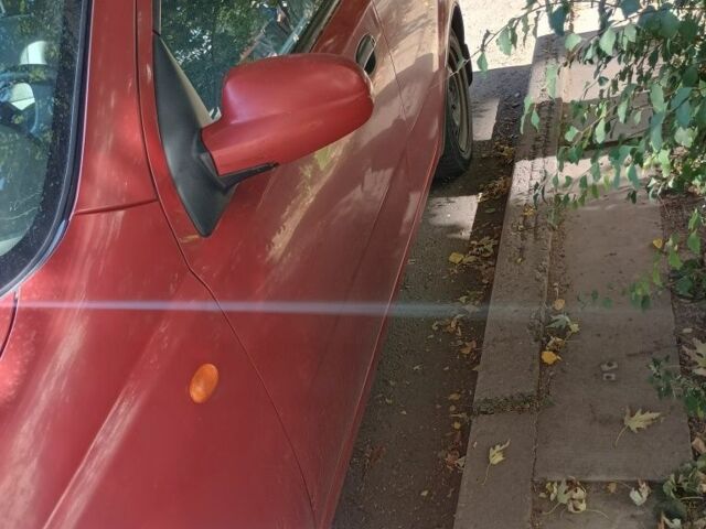 Червоний Шевроле Авео, об'ємом двигуна 1.5 л та пробігом 400 тис. км за 2100 $, фото 2 на Automoto.ua