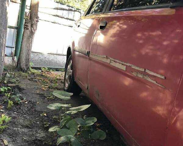 Красный Шевроле Авео, объемом двигателя 1.5 л и пробегом 220 тыс. км за 1100 $, фото 6 на Automoto.ua