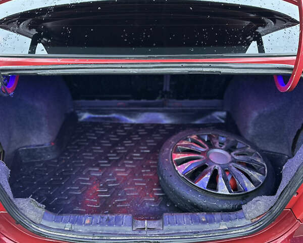 Красный Шевроле Авео, объемом двигателя 1.5 л и пробегом 268 тыс. км за 3500 $, фото 25 на Automoto.ua