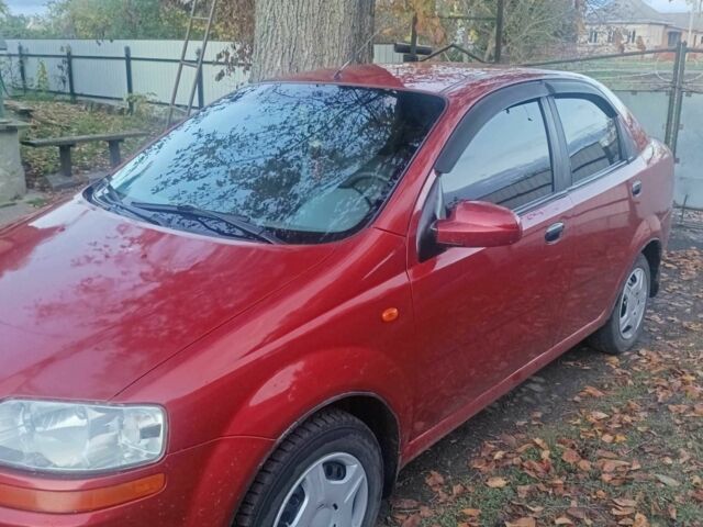 Красный Шевроле Авео, объемом двигателя 1.5 л и пробегом 290 тыс. км за 2400 $, фото 1 на Automoto.ua