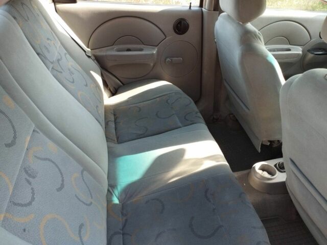 Красный Шевроле Авео, объемом двигателя 1.5 л и пробегом 350 тыс. км за 1800 $, фото 13 на Automoto.ua