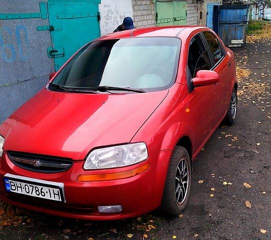 Красный Шевроле Авео, объемом двигателя 1.5 л и пробегом 280 тыс. км за 2650 $, фото 4 на Automoto.ua