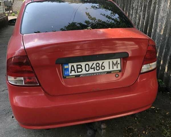 Красный Шевроле Авео, объемом двигателя 1.5 л и пробегом 220 тыс. км за 1100 $, фото 2 на Automoto.ua