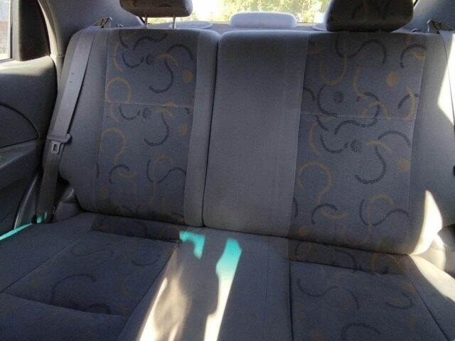 Красный Шевроле Авео, объемом двигателя 1.5 л и пробегом 350 тыс. км за 1800 $, фото 2 на Automoto.ua