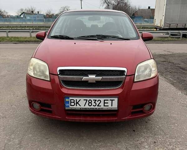 Красный Шевроле Авео, объемом двигателя 1.4 л и пробегом 169 тыс. км за 4200 $, фото 1 на Automoto.ua
