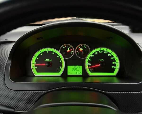 Красный Шевроле Авео, объемом двигателя 1.4 л и пробегом 169 тыс. км за 4200 $, фото 24 на Automoto.ua