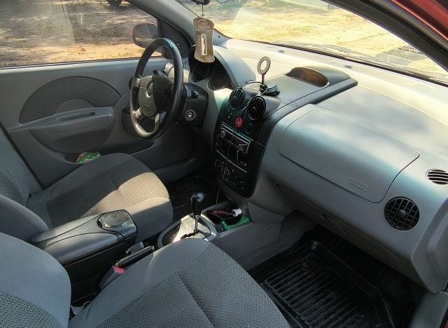 Красный Шевроле Авео, объемом двигателя 1.5 л и пробегом 225 тыс. км за 4500 $, фото 6 на Automoto.ua