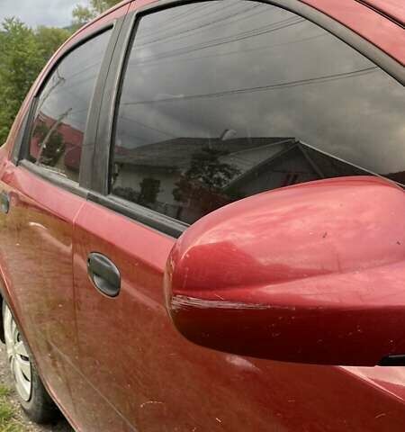 Красный Шевроле Авео, объемом двигателя 1.5 л и пробегом 157 тыс. км за 3700 $, фото 5 на Automoto.ua