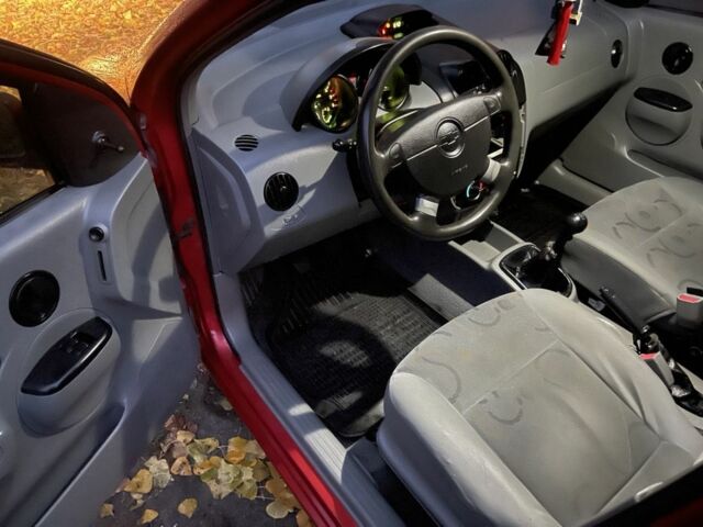 Красный Шевроле Авео, объемом двигателя 1.5 л и пробегом 224 тыс. км за 3200 $, фото 5 на Automoto.ua