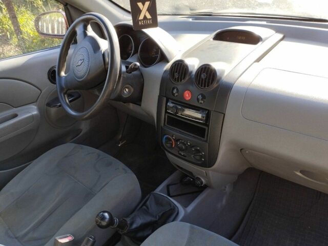 Красный Шевроле Авео, объемом двигателя 1.5 л и пробегом 350 тыс. км за 1800 $, фото 14 на Automoto.ua