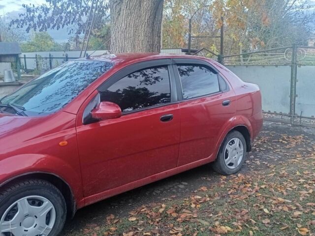 Красный Шевроле Авео, объемом двигателя 1.5 л и пробегом 290 тыс. км за 2400 $, фото 4 на Automoto.ua