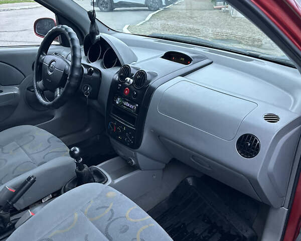 Красный Шевроле Авео, объемом двигателя 1.5 л и пробегом 268 тыс. км за 3500 $, фото 17 на Automoto.ua