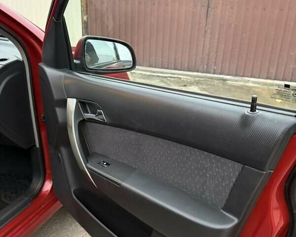 Красный Шевроле Авео, объемом двигателя 1.4 л и пробегом 169 тыс. км за 4200 $, фото 10 на Automoto.ua