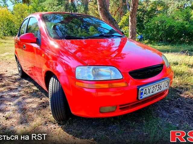 Красный Шевроле Авео, объемом двигателя 1.5 л и пробегом 318 тыс. км за 3000 $, фото 2 на Automoto.ua
