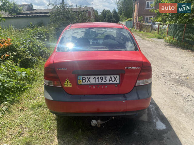 Красный Шевроле Авео, объемом двигателя 1.5 л и пробегом 255 тыс. км за 1800 $, фото 2 на Automoto.ua