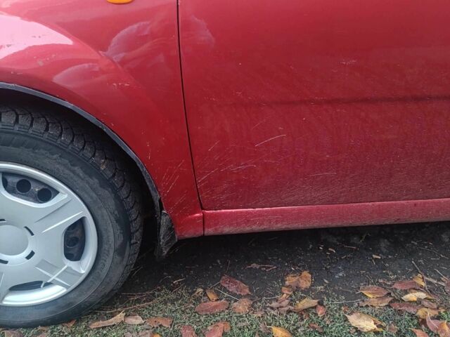 Красный Шевроле Авео, объемом двигателя 1.5 л и пробегом 290 тыс. км за 2400 $, фото 12 на Automoto.ua