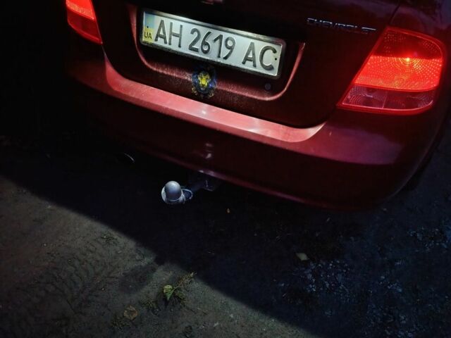 Червоний Шевроле Авео, об'ємом двигуна 2 л та пробігом 250 тис. км за 2500 $, фото 6 на Automoto.ua