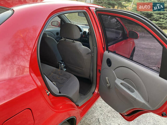 Красный Шевроле Авео, объемом двигателя 1.5 л и пробегом 223 тыс. км за 3200 $, фото 13 на Automoto.ua