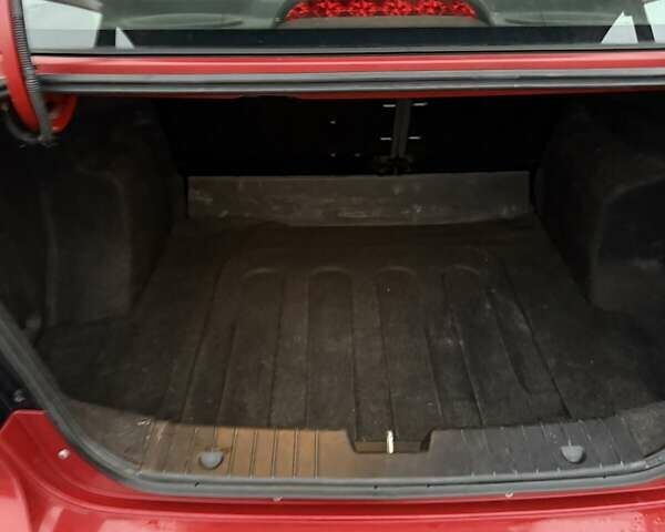 Красный Шевроле Авео, объемом двигателя 1.4 л и пробегом 169 тыс. км за 4200 $, фото 12 на Automoto.ua