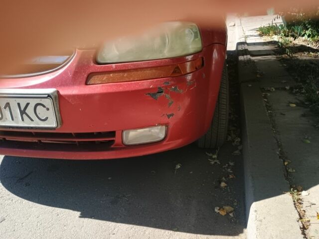 Червоний Шевроле Авео, об'ємом двигуна 1.5 л та пробігом 400 тис. км за 2100 $, фото 3 на Automoto.ua